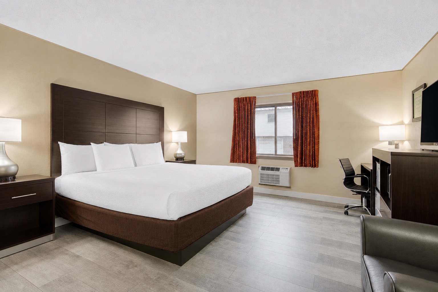 Guest room with king bed at SureStay by Best Western Massena